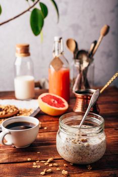 Healthy breakfast with homemade granola, turkish coffee, fruits and freshly squeezed juice