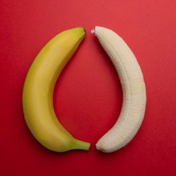 one peeled and one whole banana