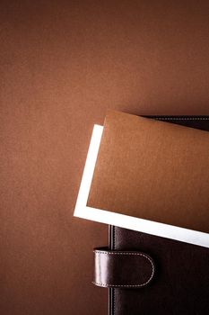 Productivity, work and corporate lifestyle concept - Vintage business briefcase on the office table desk, flatlay background