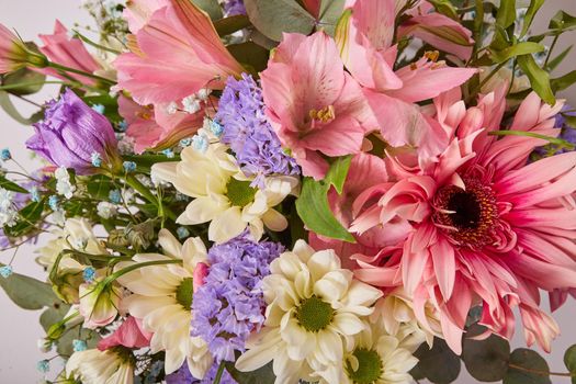 Beautiful bouquet of natural flowers close-up. Selective focus