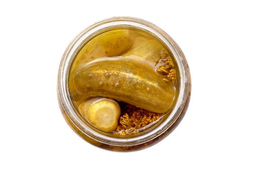 top view of pickled cucumbers in glass jar on white background