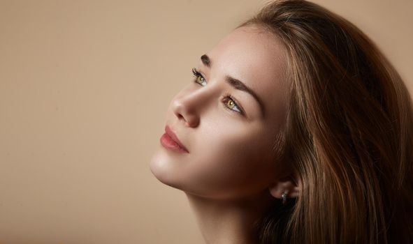 Portrait of a woman with a beautiful eye color. Sensual images of woman concept.