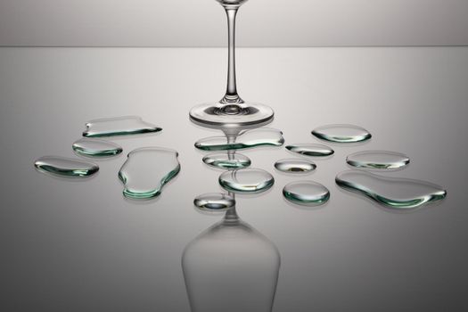 Empty wine glasses on a clean gradient background. Empty drinking transparent wine glasses