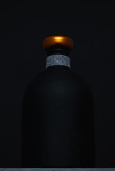 Empty Luxury Black Glass Whiskey on the black background