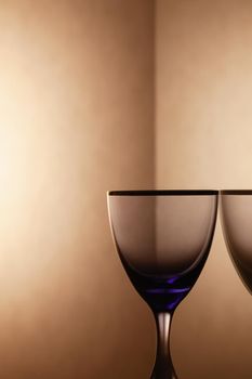 Empty wine glasses on a clean gradient background. Empty drinking transparent wine glass