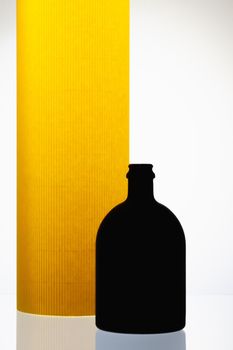 Luxury Black Glass of Rum on the yellow  background