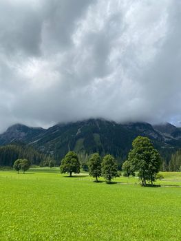 Landscape in Ramsau am Dachstein, Austria. This wonderful area of alpine pastures at the foot of the imposing south wall of Dachstein offers many hiking and amazing lookout points.