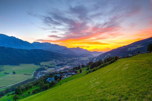 Dachstein mountain and Schladming city at sunrise. Views from Rohrmoos-Untertal, Austria. Rohrmoos-Untertal is a rural district known as a winter sports resort.