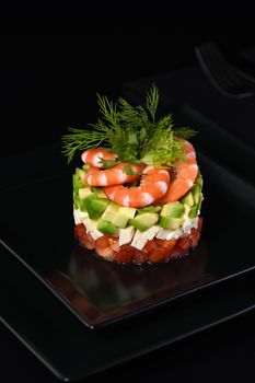  Tartare avocado   with mozzarella, tomatoes and shrimps.