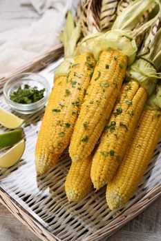 Tender, juicy grilled corn on the cob, seasoned butter with spicy curry and cilantro, grilled