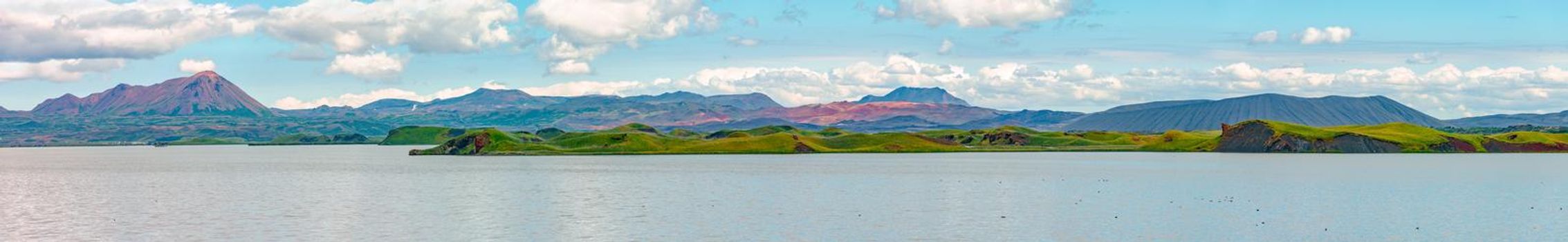 Panoramic view of pseudo craters, volcanoes and geothermal areas near Skutustadir and lake Myvatn in Iceland