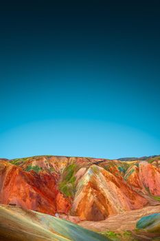 Colorful rainbow like rhyolite volcanic mountains Landmannalaugar in Icelandic Highlands as pure wilderness in Iceland, summer