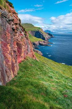 Mythical Faroe Islands in the middle of Atlantic Ocean with a lot of puffins, parrot like seabirds