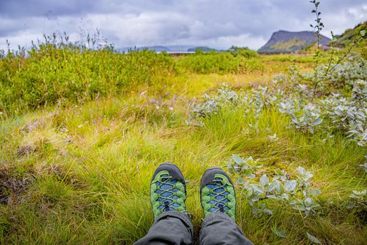 Looking at the rough nature in wild, while hiking in Iceland