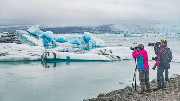 Touristic activity in Glacier Lagoon Jokulsarlon with icebergs in Iceland