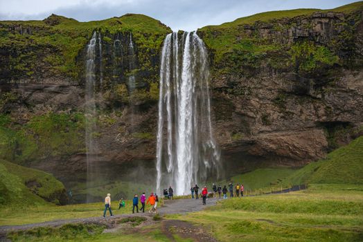 Beautiful, with cave inside Seljalandsfoss waterfall in South Iceland