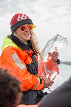 Touristic activity in Glacier Lagoon Jokulsarlon with icebergs in Iceland