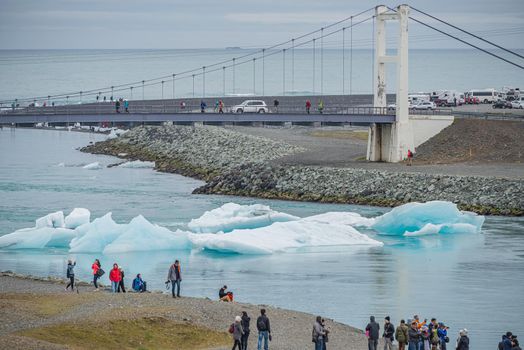 Touristic activity in Glacier Lagoon Jokulsarlon with icebergs in Iceland