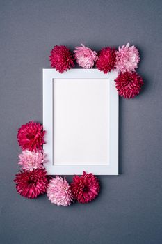 Picture frame mockup decorated with chrysanthemum flowers