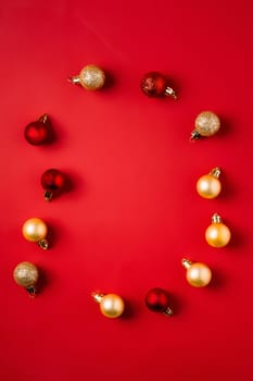 Christmas composition. Red and golden ornament and baubles decorations.