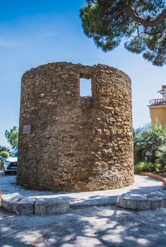 Old windmill Bormes-les-Mimosas typical village in the south of France