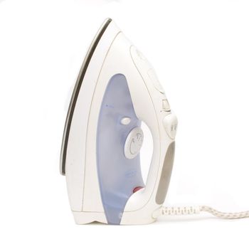 Steam iron isolated on white background.Stands upright