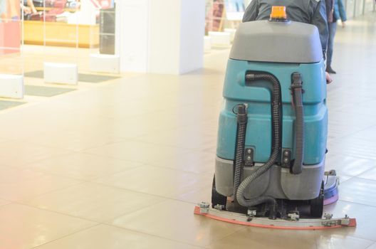 Floor care and cleaning machine in shopping centre.