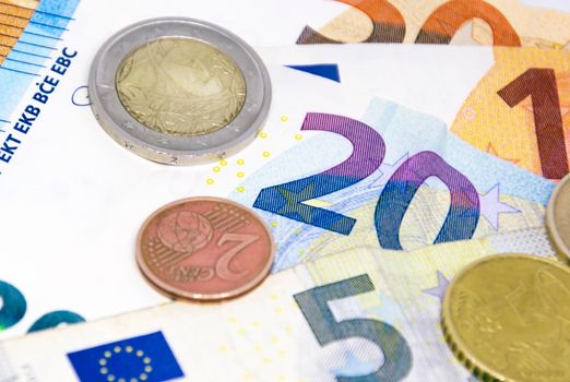 European Union coins and banknotes of different values. The euro is the European currency. Finance, economy and business. Cash and savings