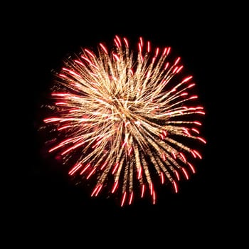 Colorful fireworks isolated on black sky background.