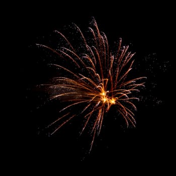 Colorful fireworks isolated on black sky background.