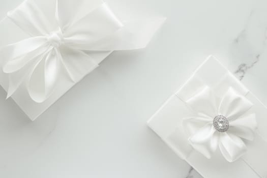 Romantic celebration, lifestyle and holiday present concept - Luxury wedding gifts on marble