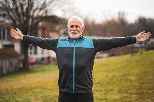 Active senior man is exercising. Healthy retirement lifestyle.