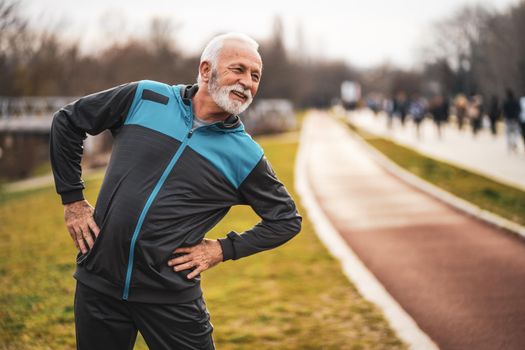 Active senior man is exercising. Healthy retirement lifestyle.