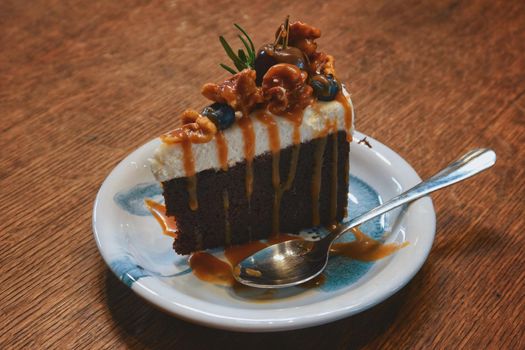 dark chocolate cake with hazelnut caramel and berry