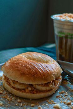 closeup bagel bread with banana and peanut butter