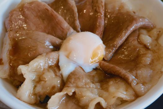 closeup wagyu beef with onsen egg