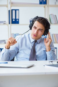 Sales assistant listening to music during lunch break