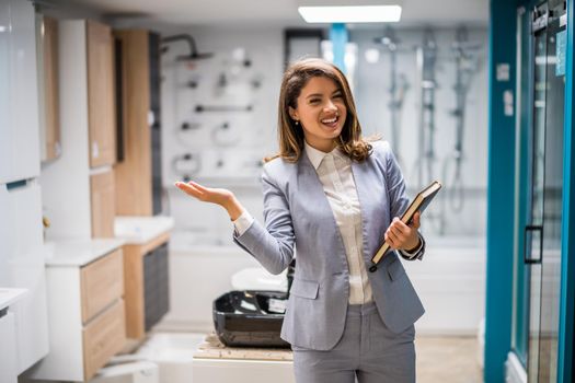 Woman owning small business bath store. Female entrepreneur concept. Happy businesswoman portrait.