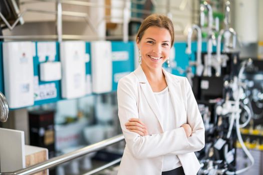 Woman owning small business bath store. Female entrepreneur concept. Happy businesswoman portrait.