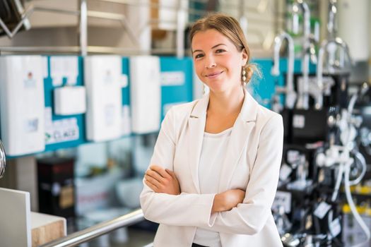 Woman owning small business bath store. Female entrepreneur concept. Happy businesswoman portrait.