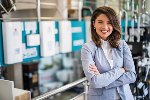 Woman owning small business bath store. Female entrepreneur concept. Happy businesswoman portrait.