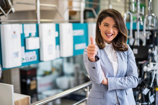 Woman owning small business bath store. Female entrepreneur concept. Happy businesswoman portrait.