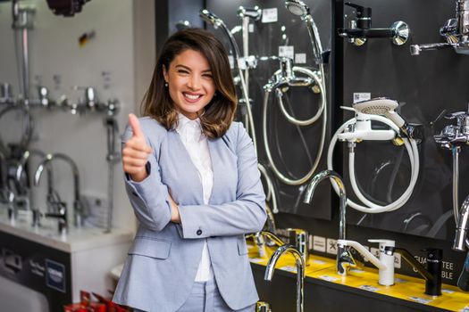 Woman owning small business bath store. Female entrepreneur concept. Happy businesswoman portrait.