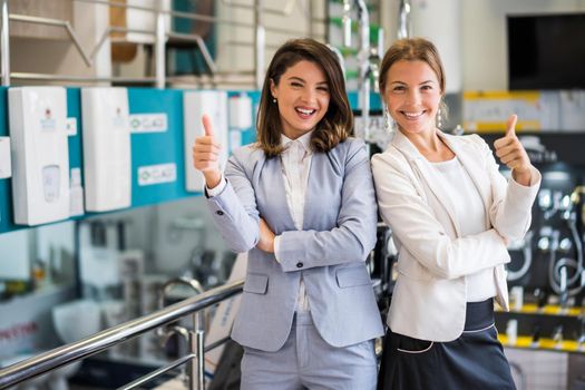 Two women owning small business bath store. They are partners in business. Female entrepreneur concept.