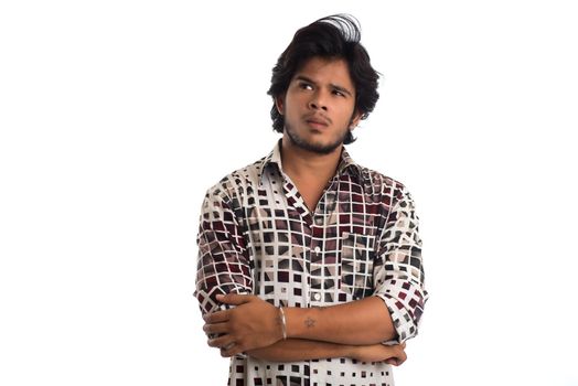 Young man posing on a white background