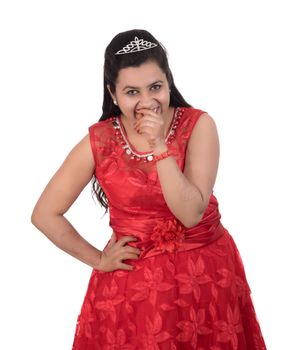 Young girl in red dress posing on white background