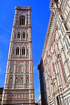 Digital color painting style of a glimpse of the bell tower of Florence and the facade of the church