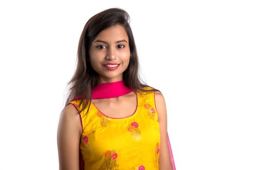 Portrait of beautiful young smiling girl on a white background.