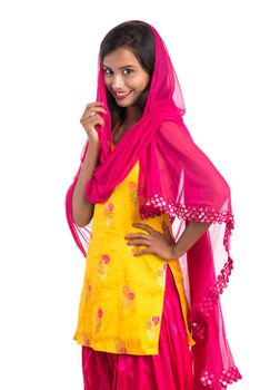 Beautiful Indian traditional girl posing on white background.