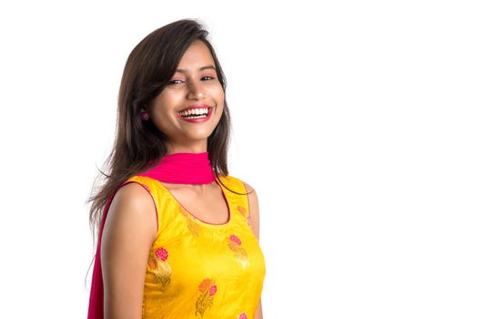 Portrait of beautiful young smiling girl on a white background.